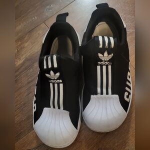 Adidas Toddler Black and White Slip-On Shoes